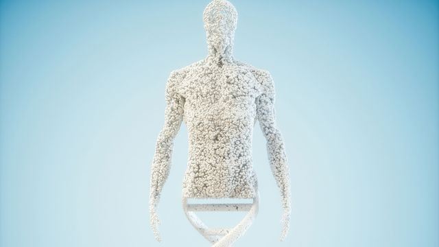 A human head, torso and arms made from white spheres. Below the torso connects to a DNA molecule also made of white spheres. The background is light blue. 