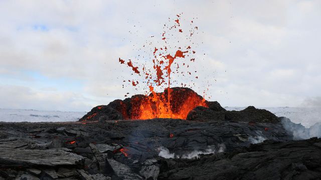 Lava erupting from an active volcano in Iceland. 